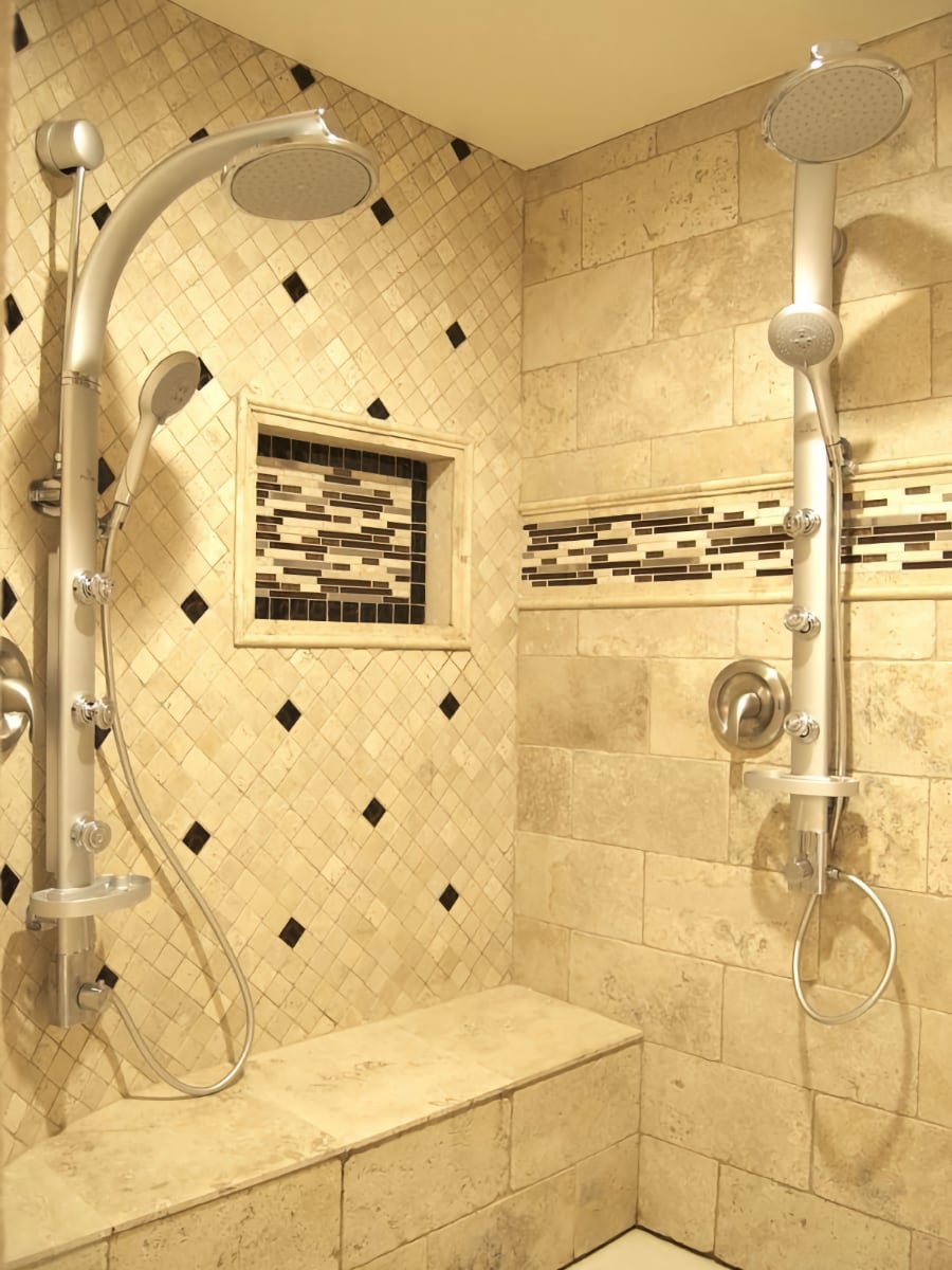 tiled shower with fancy shower heads