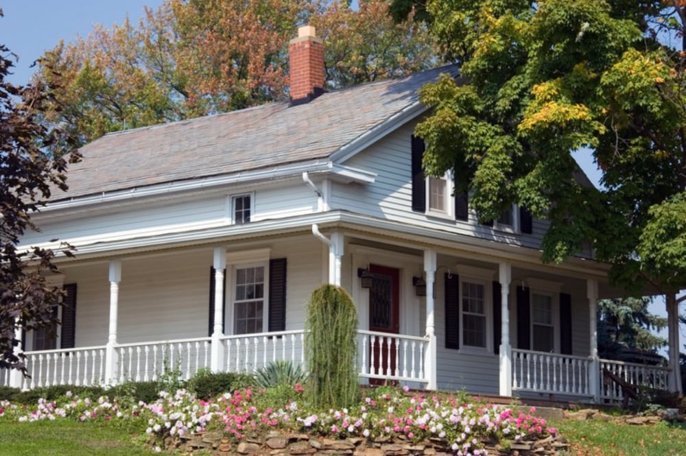 A white historic farmhouse