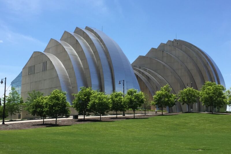 Kauffman center, large silver building with trees in front