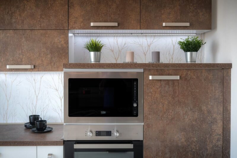 Modern kitchen with medium wood tones and modern appliances