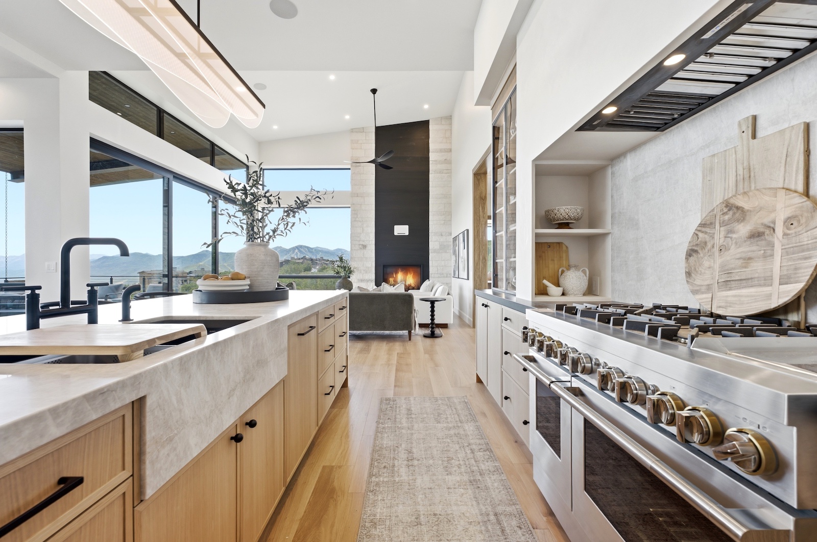 Halo Crest kitchen with custom cabinetry and professional range in Hideout, Utah